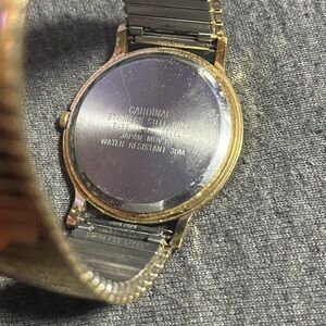 Cardinal Gold-Tone woman’s Watch